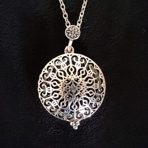 Magnifying glass pendant